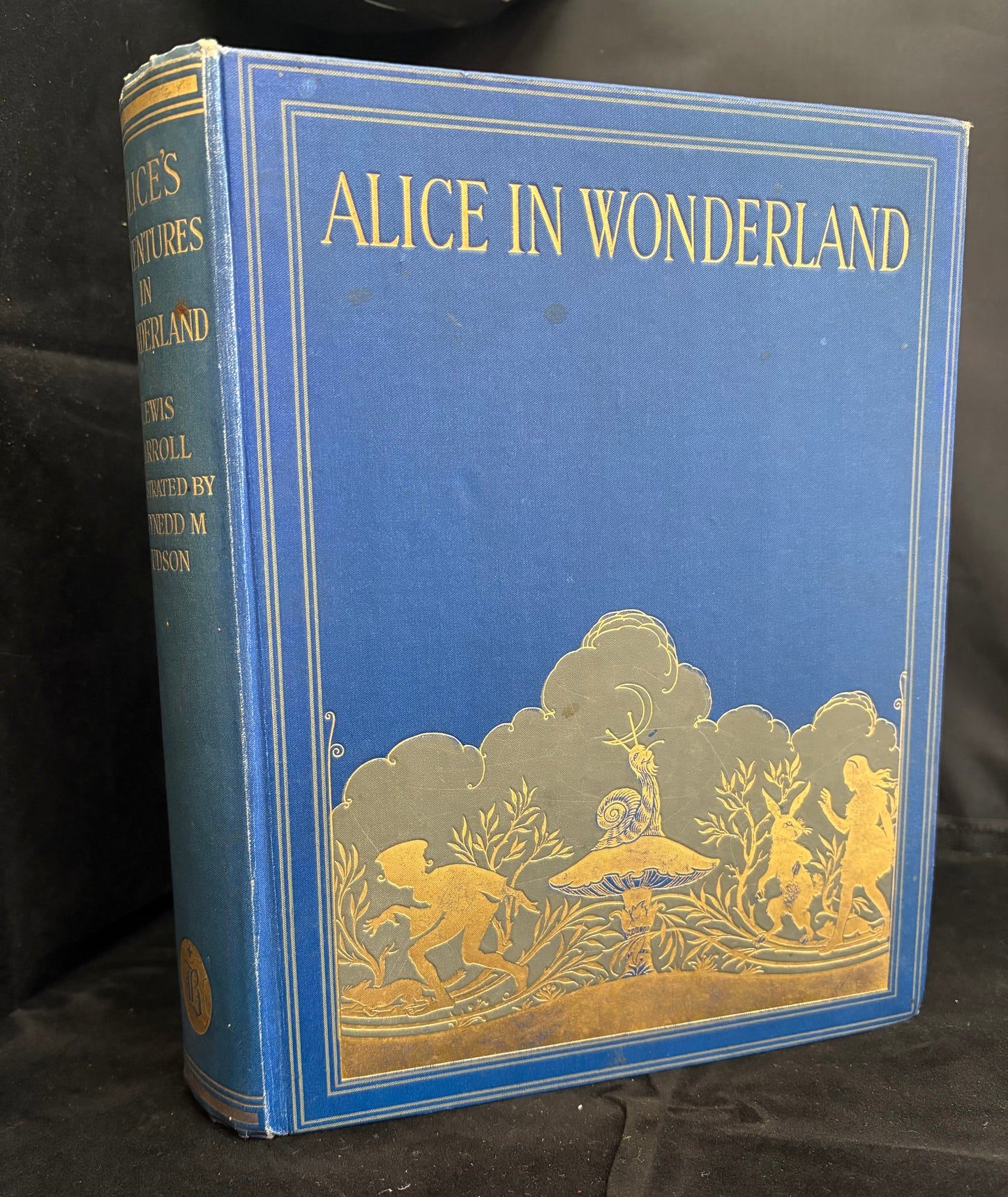 Carroll, Lewis.                 Alice in Wonderland.  Illustrated by Gwynedd M Hudson.      First thus.